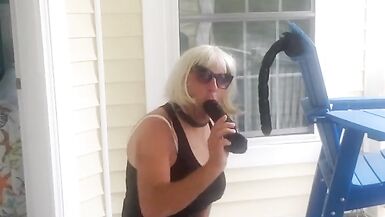 DeeDeeSlut69 on Balcony with Horse Cock - 9 image