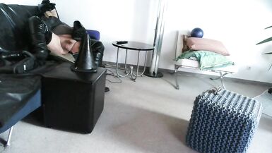 latex masked perv bessy enjoys sitting on giant dildoplug - 14 image