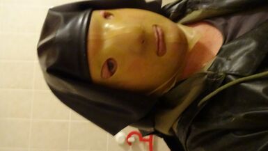 latex masked nun latexbessy fuck-rubber take up with the tongue large vibrator insertion - 1 image