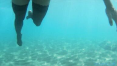 nylondelux in stocking red toes at the seaside - 14 image