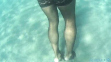 nylondelux in stocking red toes at the seaside - 15 image