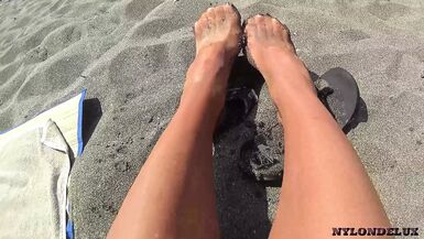 nylondelux nude pantyhose on the beach - 1 image