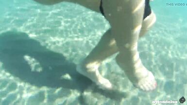 nylondelux in white pantyhose on the public beach - 6 image