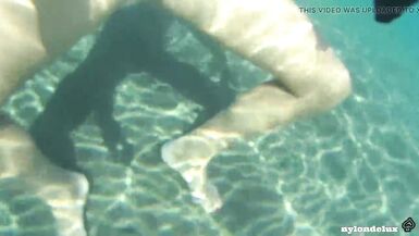 nylondelux in white pantyhose on the public beach - 7 image