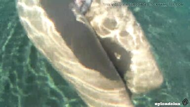 nylondelux in white pantyhose on the public beach - 8 image