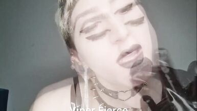 Kinky sissy in shiny latex bodysuit and high boots plays with cock and cums in her mouth - 10 image