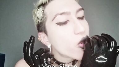 Kinky sissy in shiny latex bodysuit and high boots plays with cock and cums in her mouth - 11 image