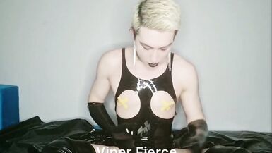 Kinky sissy in shiny latex bodysuit and high boots plays with cock and cums in her mouth - 2 image