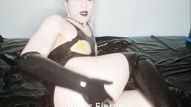 Kinky sissy in shiny latex bodysuit and high boots plays with cock and cums in her mouth - 3 image