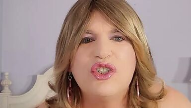 Tiny clit stocking clad sissy, spreading her legs , wanting a real man in her bed - 1 image