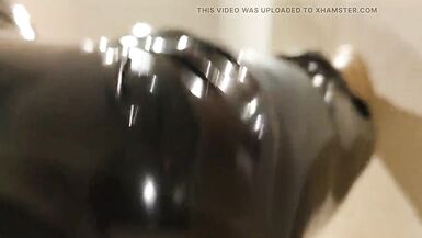 Alice Latexy worshiping a dildo while on her knees in the bathroom - 9 image