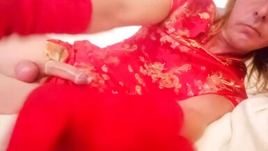 Leatransteen wearing a Red Asia robe and fills her condom