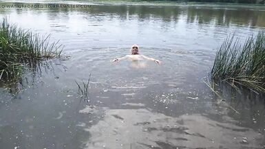Alexa Cosmic transgirl swimming in clothes in river in jeans shirts and white t-shirt. Alexa Cosmic Wetlook Lover. - 10 image