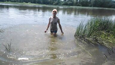 Alexa Cosmic transgirl swimming in clothes in river in jeans shirts and white t-shirt. Alexa Cosmic Wetlook Lover. - 11 image
