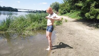Alexa Cosmic transgirl swimming in clothes in river in jeans shirts and white t-shirt. Alexa Cosmic Wetlook Lover.