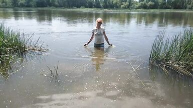 Alexa Cosmic transgirl swimming in clothes in river in jeans shirts and white t-shirt. Alexa Cosmic Wetlook Lover. - 3 image