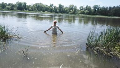 Alexa Cosmic transgirl swimming in clothes in river in jeans shirts and white t-shirt. Alexa Cosmic Wetlook Lover. - 5 image
