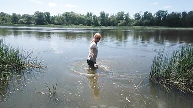 Alexa Cosmic transgirl swimming in clothes in river in jeans shirts and white t-shirt. Alexa Cosmic Wetlook Lover. - 6 image
