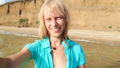 Alexa Cosmic transgirl swimming in the sea first time in teal combi dress - 1 image