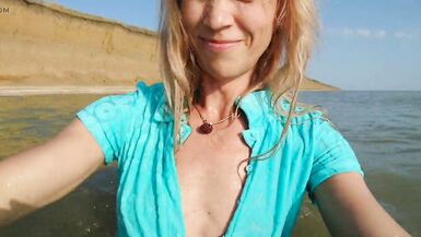 Alexa Cosmic transgirl swimming in the sea first time in teal combi dress