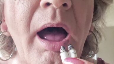 Smoking two cigarettes at once - 15 image