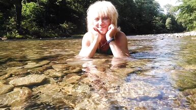 Sexy t-girl swimming in mountain river and wetting teal summer dress ... - 13 image