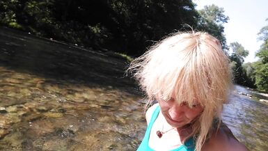 Sexy t-girl swimming in mountain river and wetting teal summer dress ... - 15 image