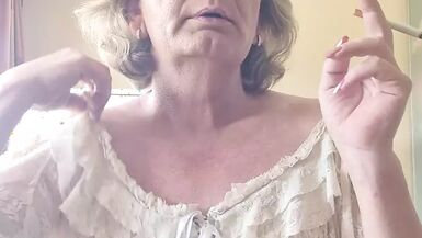 Enjoying a cigarette - 1 image