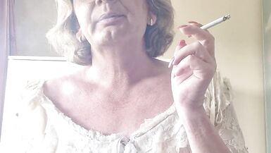 Enjoying a cigarette - 3 image