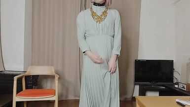 Japanese crossdresser cumshots when excited by genitals touched by long dress.