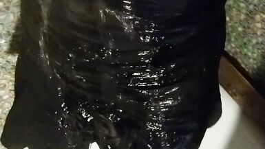 Wetlook transgirl in bathroom wearing in black dress, skirt, pantyhose and high heels - 12 image