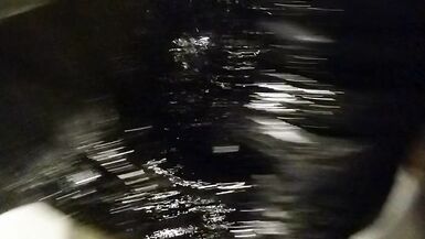 Wetlook transgirl in bathroom wearing in black dress, skirt, pantyhose and high heels - 13 image