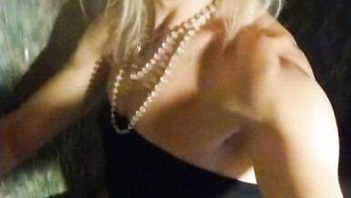 Wetlook transgirl in bathroom wearing in black dress, skirt, pantyhose and high heels - 4 image