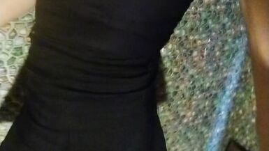 Wetlook transgirl in bathroom wearing in black dress, skirt, pantyhose and high heels - 6 image