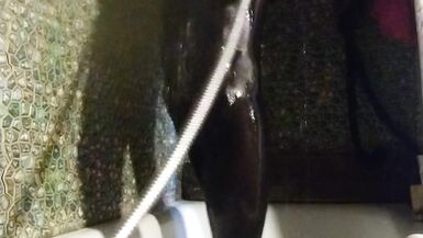 Trans girl masturbates in the bathroom wearing black pantyhose, miniskirt, dress and high heels - 5 image