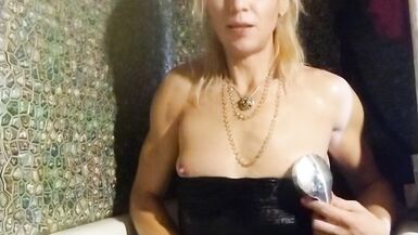 Trans girl masturbates in the bathroom wearing black pantyhose, miniskirt, dress and high heels - 9 image