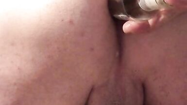 crazy shameless sissy play with her pussy with a bottle smirnoff ice with the bottom destroys her asshole and cum - 7 image