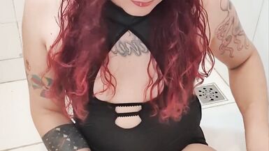 Ariela trans playing and pissing on her new heels and injecting piss in her ass - 2 image