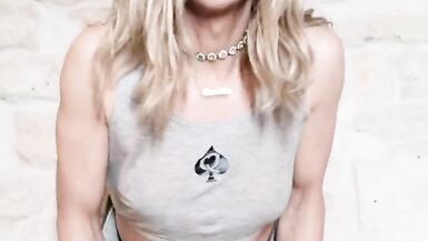 Trans Camelia in QOS croc top and sexy jeans skirt