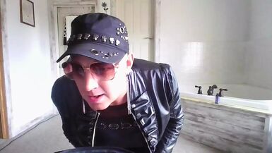 Sexy Hot Crossdresser in Leggings with French Nails Leather Jacket licking CUM - 1 image