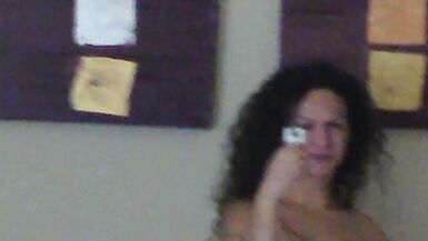 Nikki Montero playing with the mirror and with her bouncing cock - 1 image