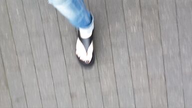 public crossdressing - showing sexy feet - 2 image