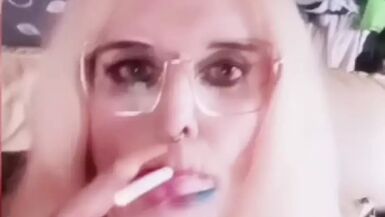Ts whore Stefanie smoking a 120mm cigarette - 1 image