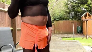 Amateur crossdresser Kellycd2022 sexy milf pissing and masturbating in black seamless pantyhose outdoors - 11 image