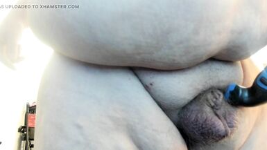 Molly is shaving her genitals while sucking on her dildo. - 10 image