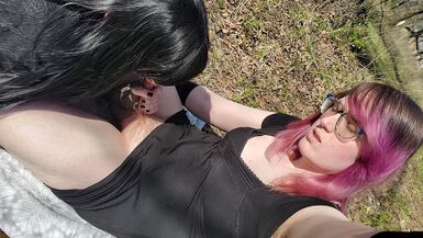 Goth trans girl gets her cock sucked outside by trans goth girlfriend - 1 image
