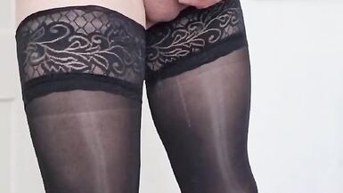 Sexy tgirl in Shiny Stockings with BIG Cock shooting a nice big Load - 8 image