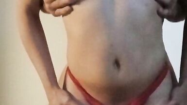 Sexy transvestite in red lingerie with real small tits gets fucked standing in front of the camera - 4 image