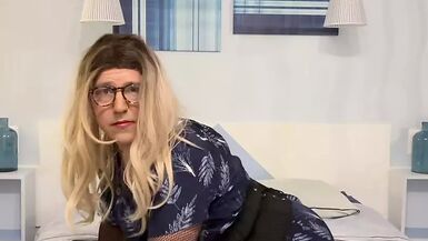 On my bed in a blue dress for a cumshot - 1 image