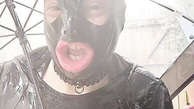 Alison outside in tight black rubber - 12 image